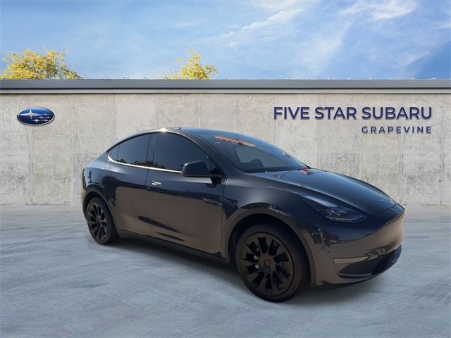 Used 2024 Tesla Model Y Long Range with VIN 7SAYGDED1RF008465 for sale in Northfield, Minnesota