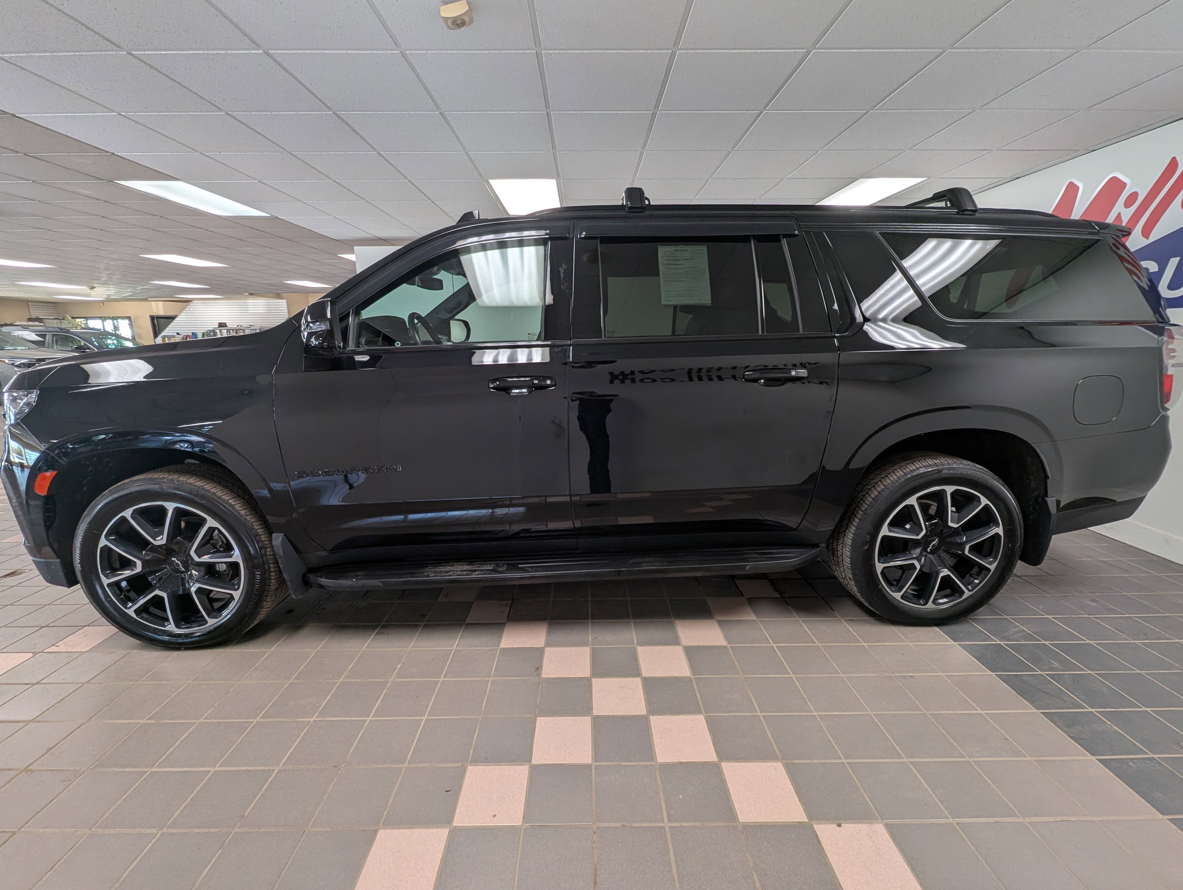 Used 2024 Chevrolet Suburban RST with VIN 1GNSKEKL8RR183932 for sale in Hermantown, Minnesota