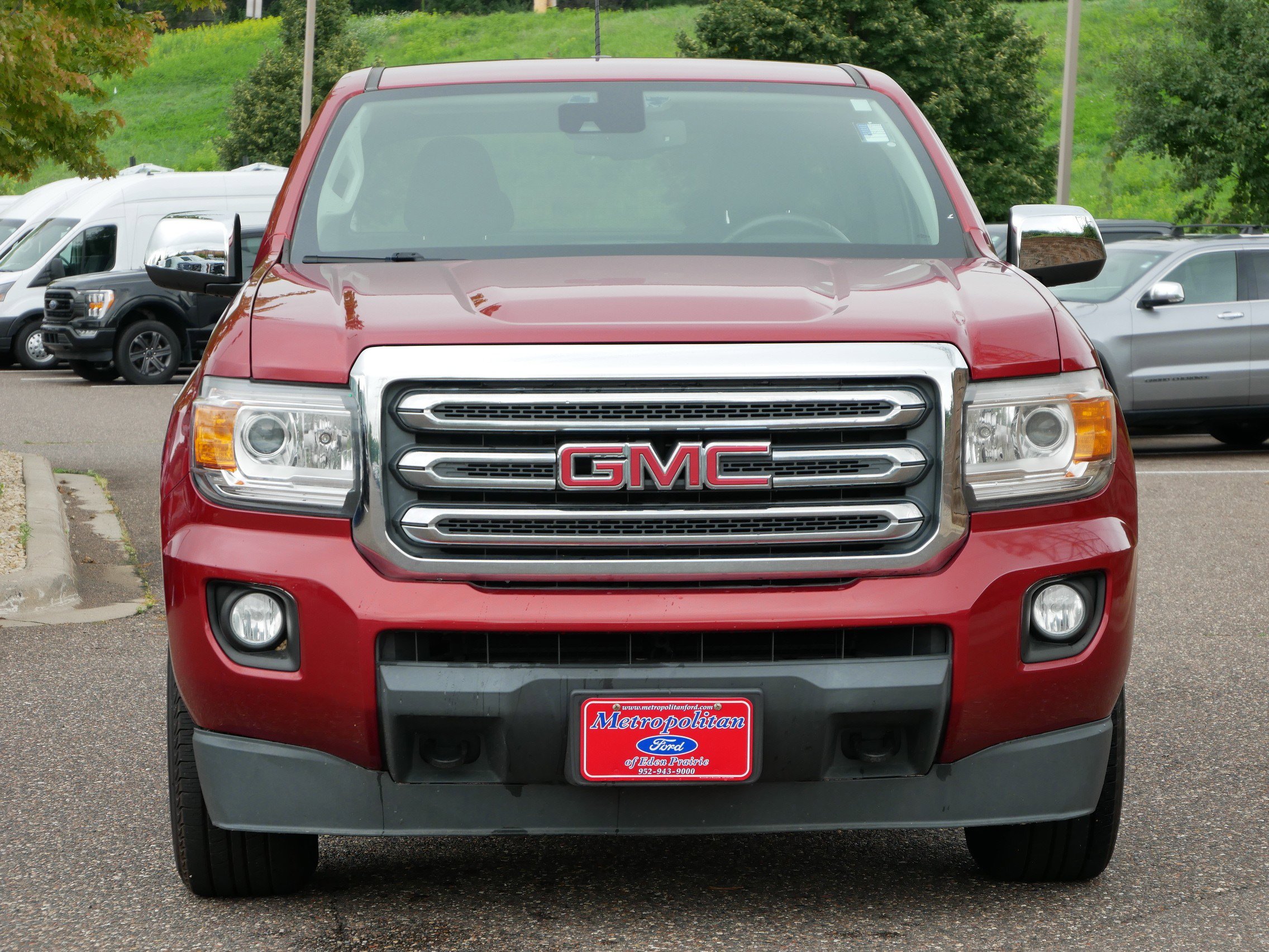 Used 2015 GMC Canyon SLE with VIN 1GTH6BEA2F1164206 for sale in Eden Prairie, Minnesota