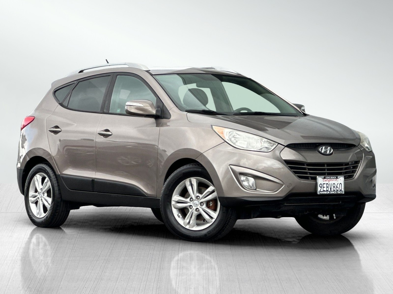 Used 2013 Hyundai Tucson GLS with VIN KM8JU3AC4DU628673 for sale in Long Beach, CA