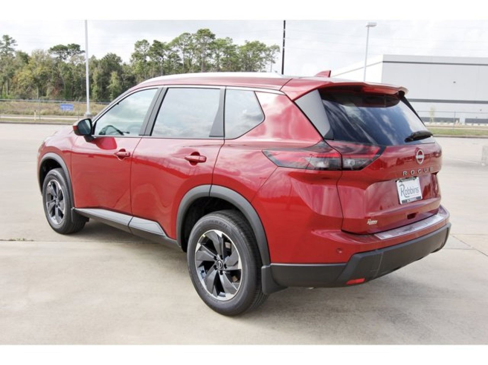 2026 Nissan Rogue SV Red at Robbins Nissan