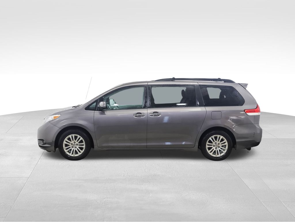 Used 2014 Toyota Sienna XLE with VIN 5TDYK3DC5ES460584 for sale in Minneapolis, Minnesota