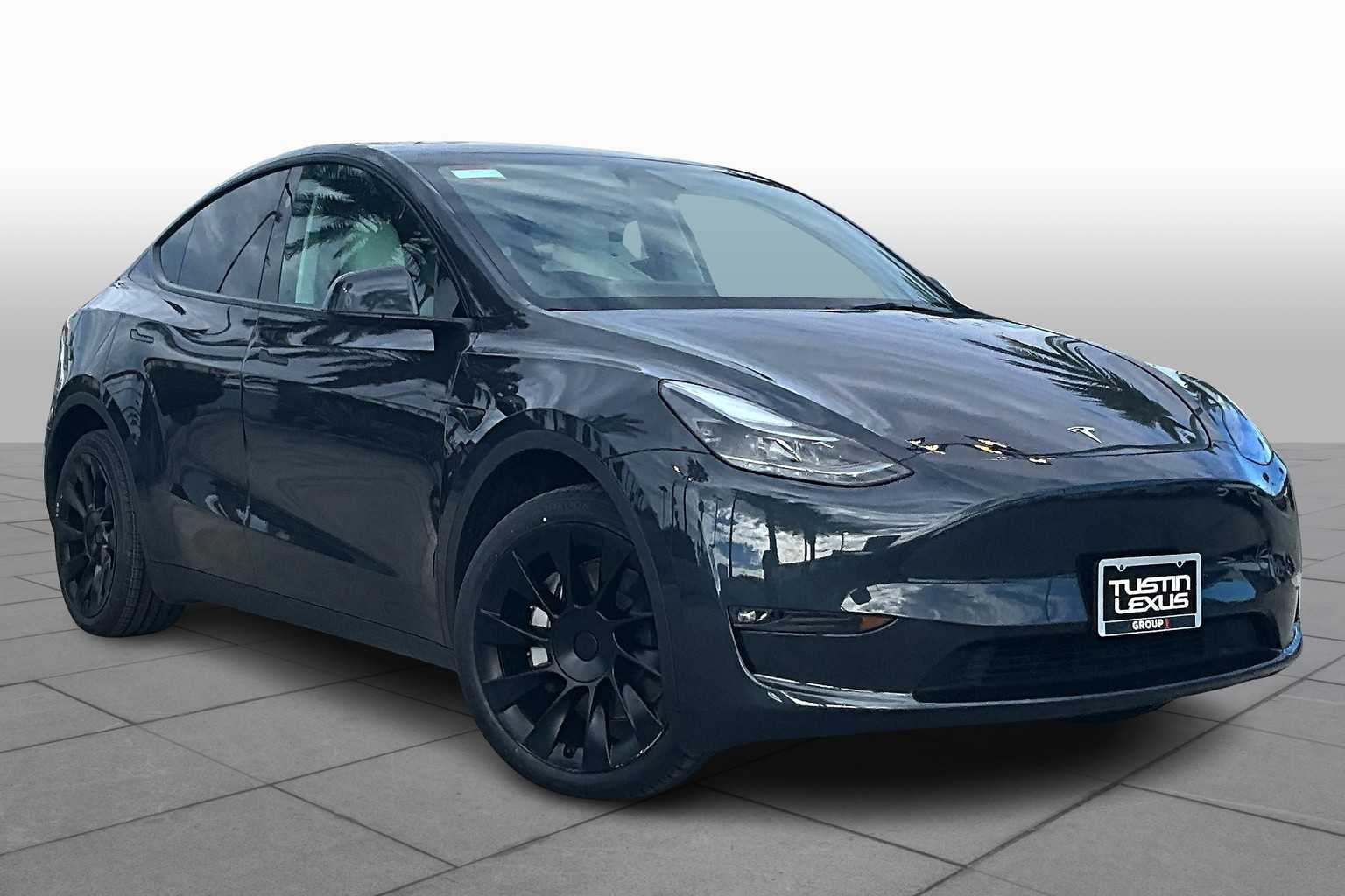 Used 2025 Tesla Model Y Long Range with VIN 7SAYGDEE6SF232846 for sale in Tustin, CA