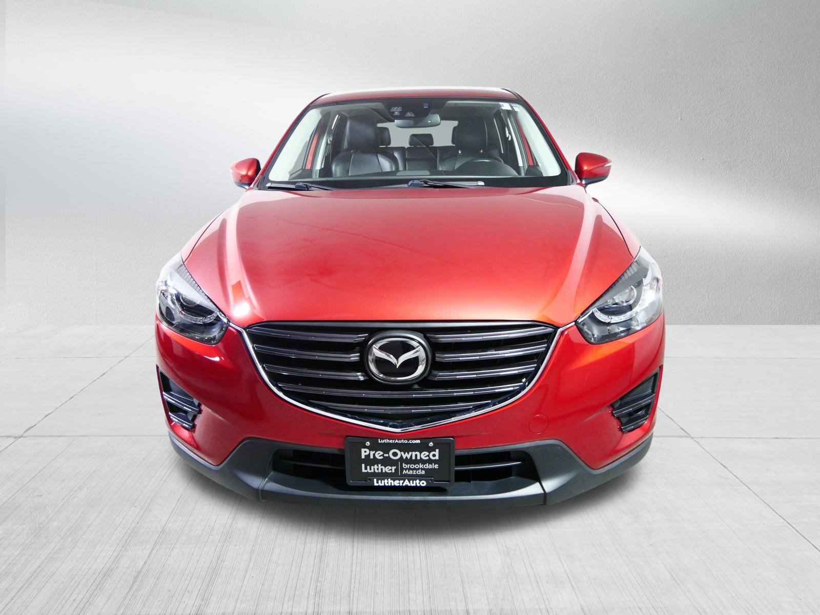 Used 2016 Mazda CX-5 Grand Touring with VIN JM3KE4DY1G0723777 for sale in Brooklyn Center, Minnesota