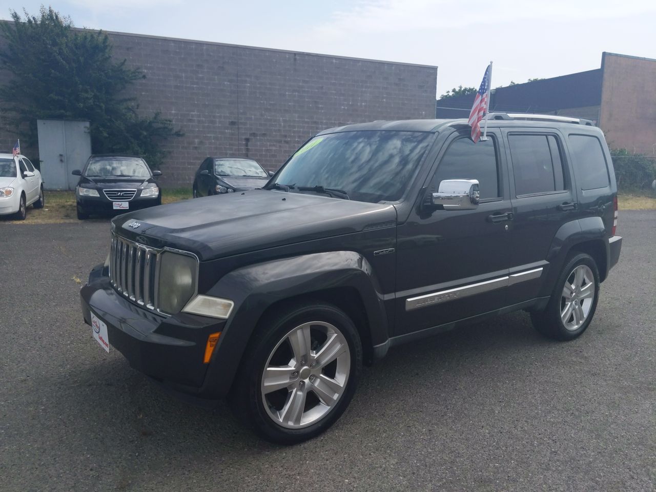 Used 2011 Gray Jeep SPORT image 1