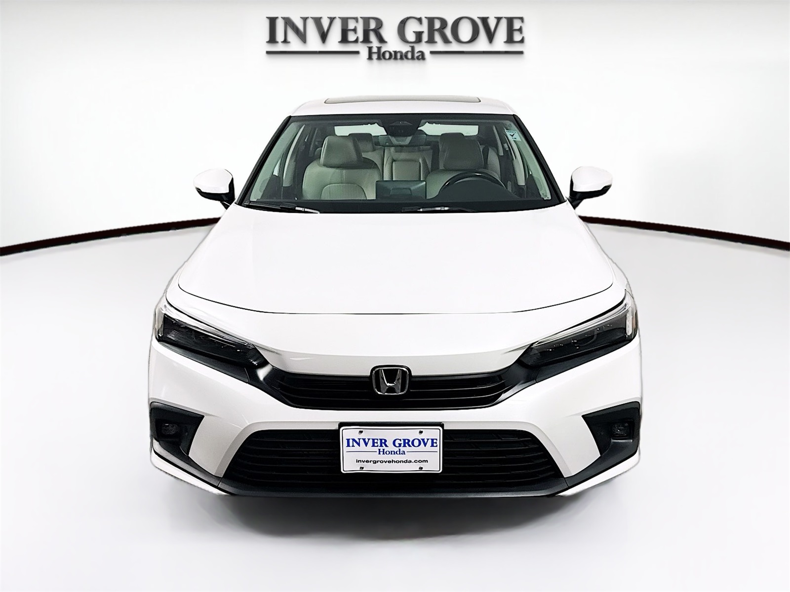 Used 2022 Honda Civic Touring with VIN 2HGFE1F98NH302860 for sale in Inver Grove Heights, Minnesota