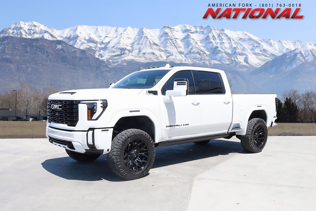 Used 2024 White Frost Tricoat GMC Denali Ultimate image 1