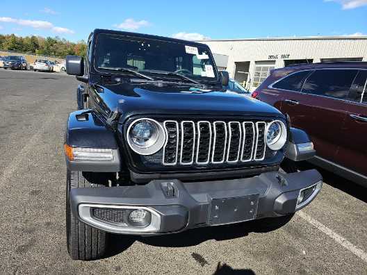 Used 2024 Jeep Wrangler 4-Door Sahara with VIN 1C4PJXEN8RW297571 for sale in Kansas City