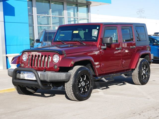Used 2010 Jeep Wrangler Unlimited Sahara with VIN 1J4BA5H11AL127026 for sale in Roseville, Minnesota