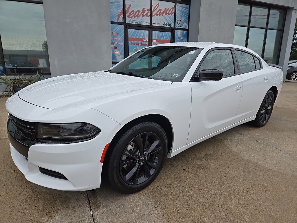 Used 2022 Dodge Charger SXT with VIN 2C3CDXJG5NH146715 for sale in Kansas City