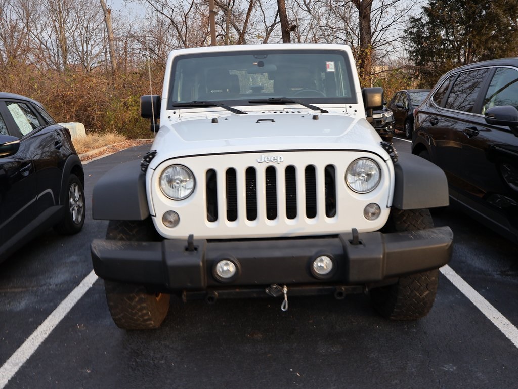 Used 2015 Jeep Wrangler Sport with VIN 1C4AJWAG2FL670723 for sale in Kansas City