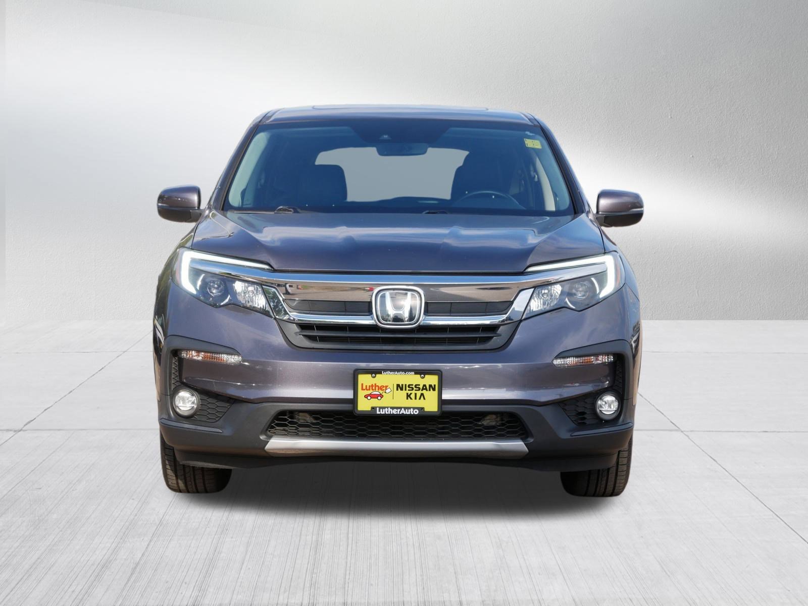 Used 2021 Honda Pilot EX-L with VIN 5FNYF6H57MB021990 for sale in Inver Grove, Minnesota