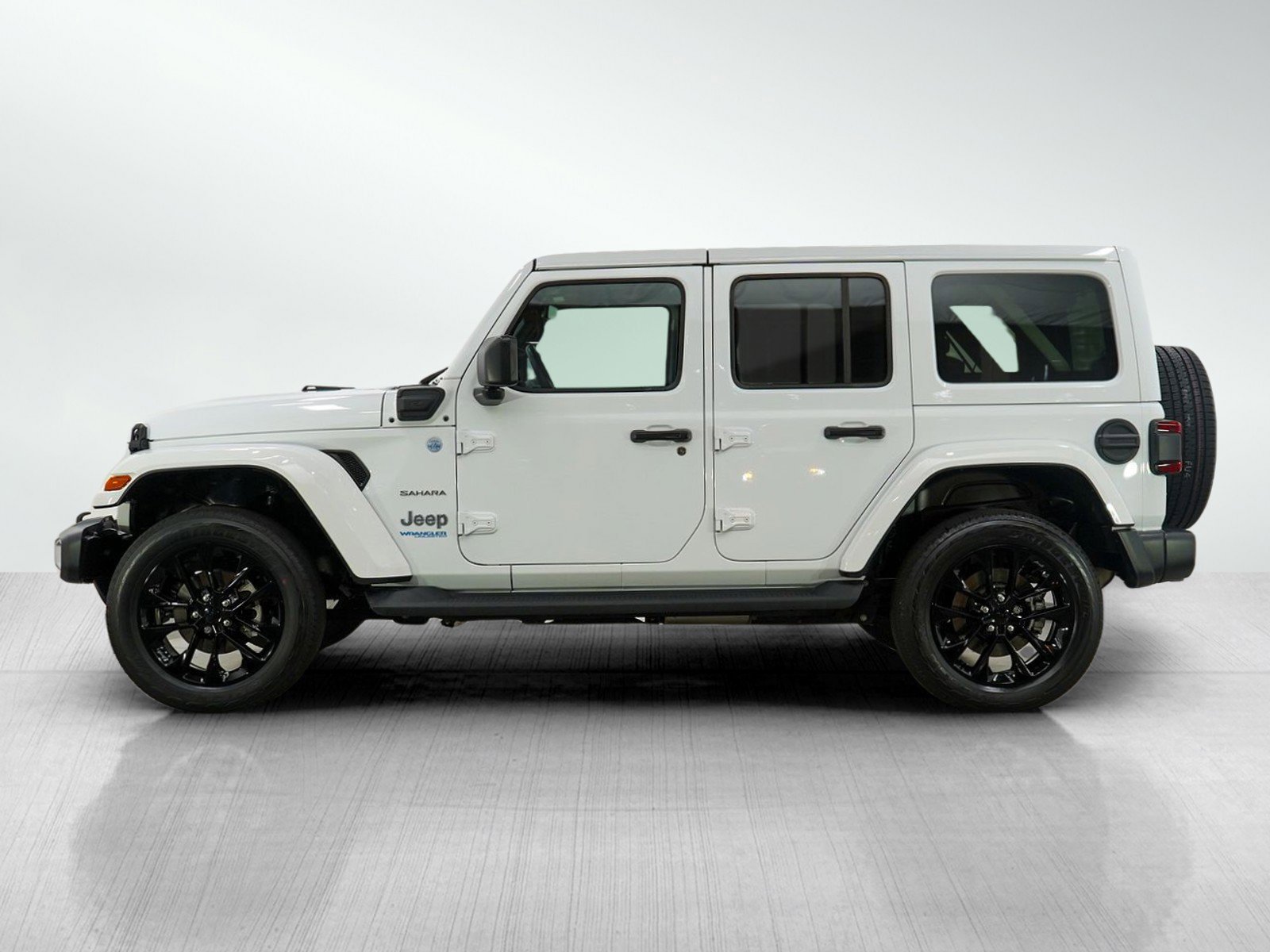 Used 2021 Jeep Wrangler Unlimited Sahara 4XE with VIN 1C4JJXP62MW757912 for sale in Hopkins, Minnesota
