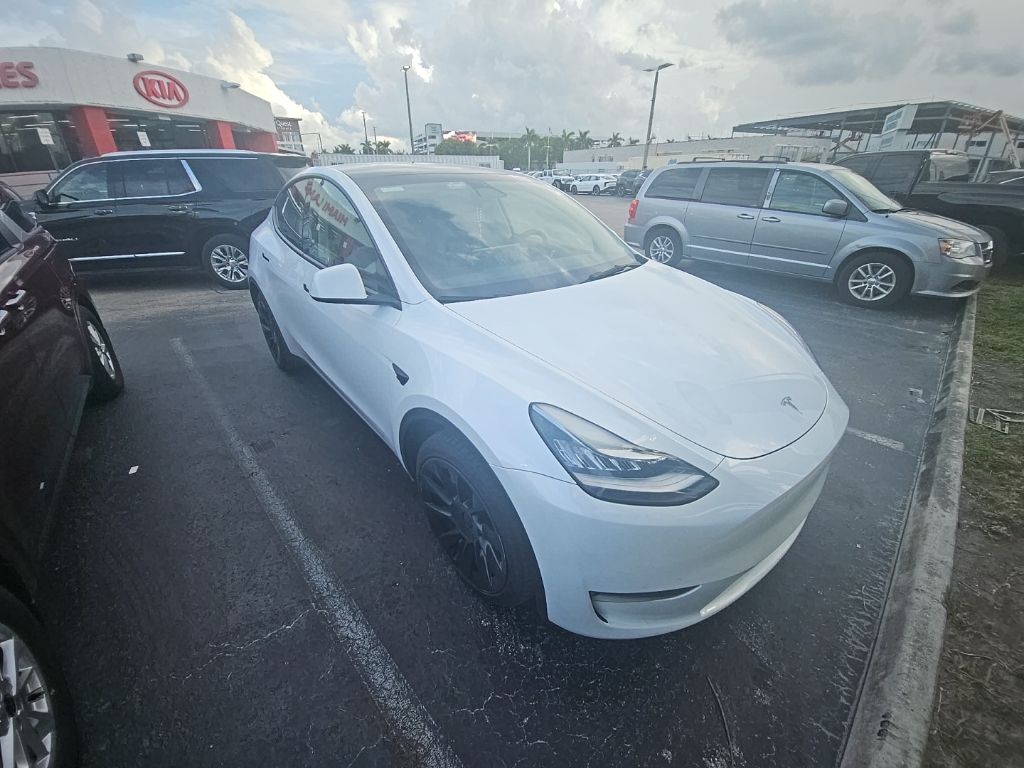 Used 2023 Tesla Model Y Long Range with VIN 7SAYGDEE2PA111428 for sale in Miami Lakes, FL