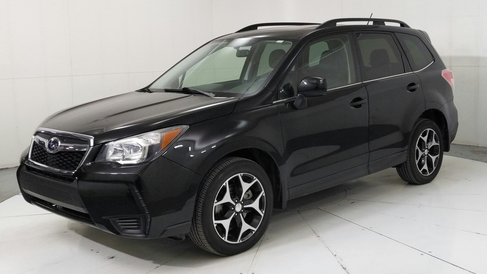 Used 2015 CRYSTAL BLACK Subaru 2.0XT Premium image 1