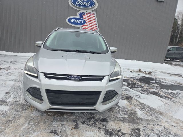 Used 2014 Ford Escape Titanium with VIN 1FMCU9J99EUD71687 for sale in Manistee, MI