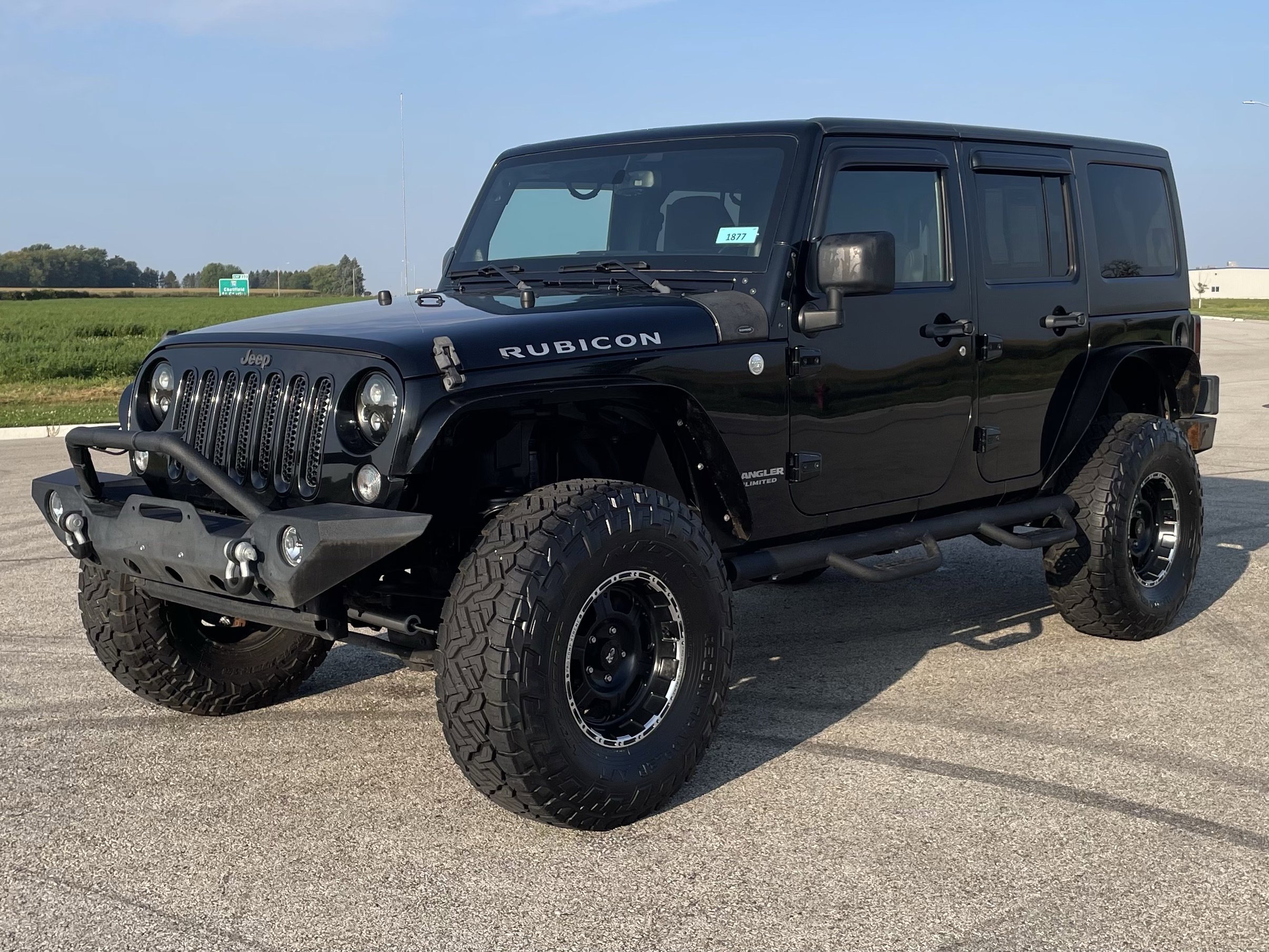 Used 2014 Jeep Wrangler Unlimited Rubicon with VIN 1C4BJWFG0EL191468 for sale in Saint Charles, Minnesota