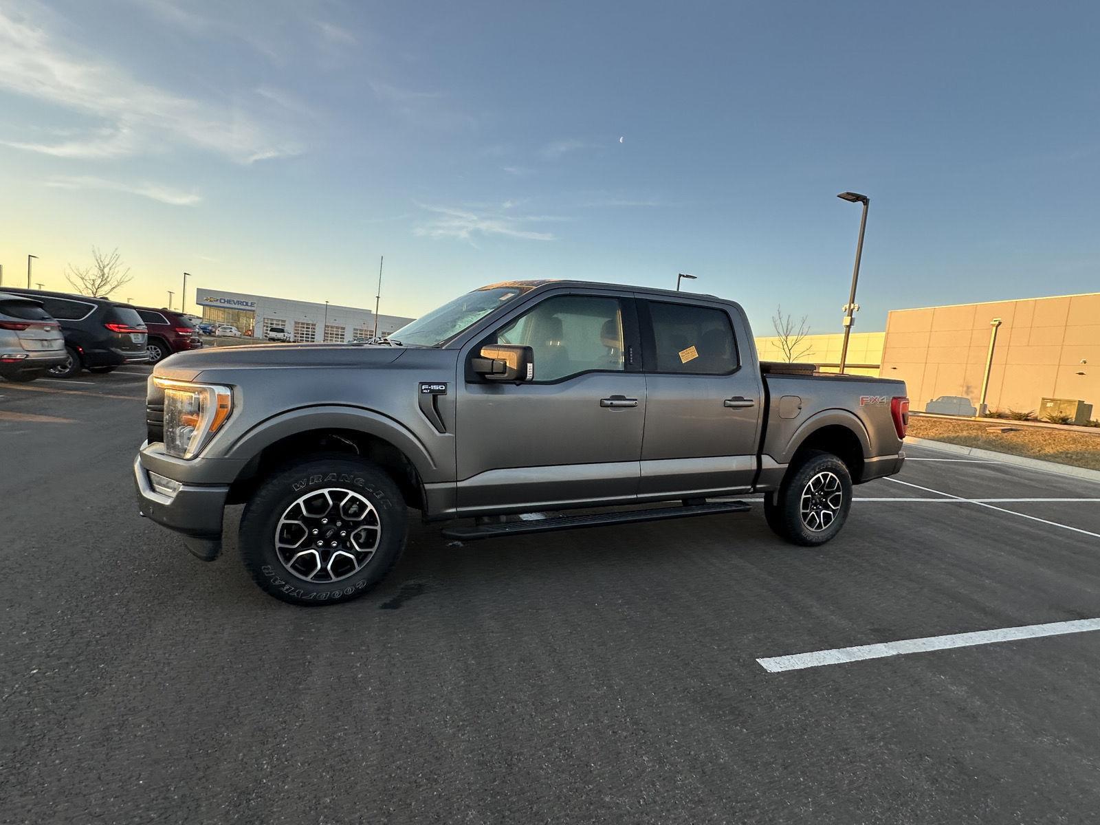 Used 2021 Ford F-150 XLT with VIN 1FTFW1E50MFC78824 for sale in Kansas City