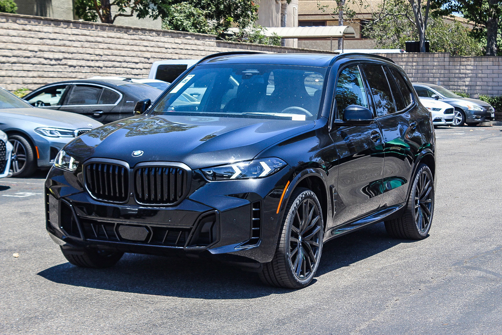 New 2026 Black Sapphire Metallic BMW sDrive40i image 3