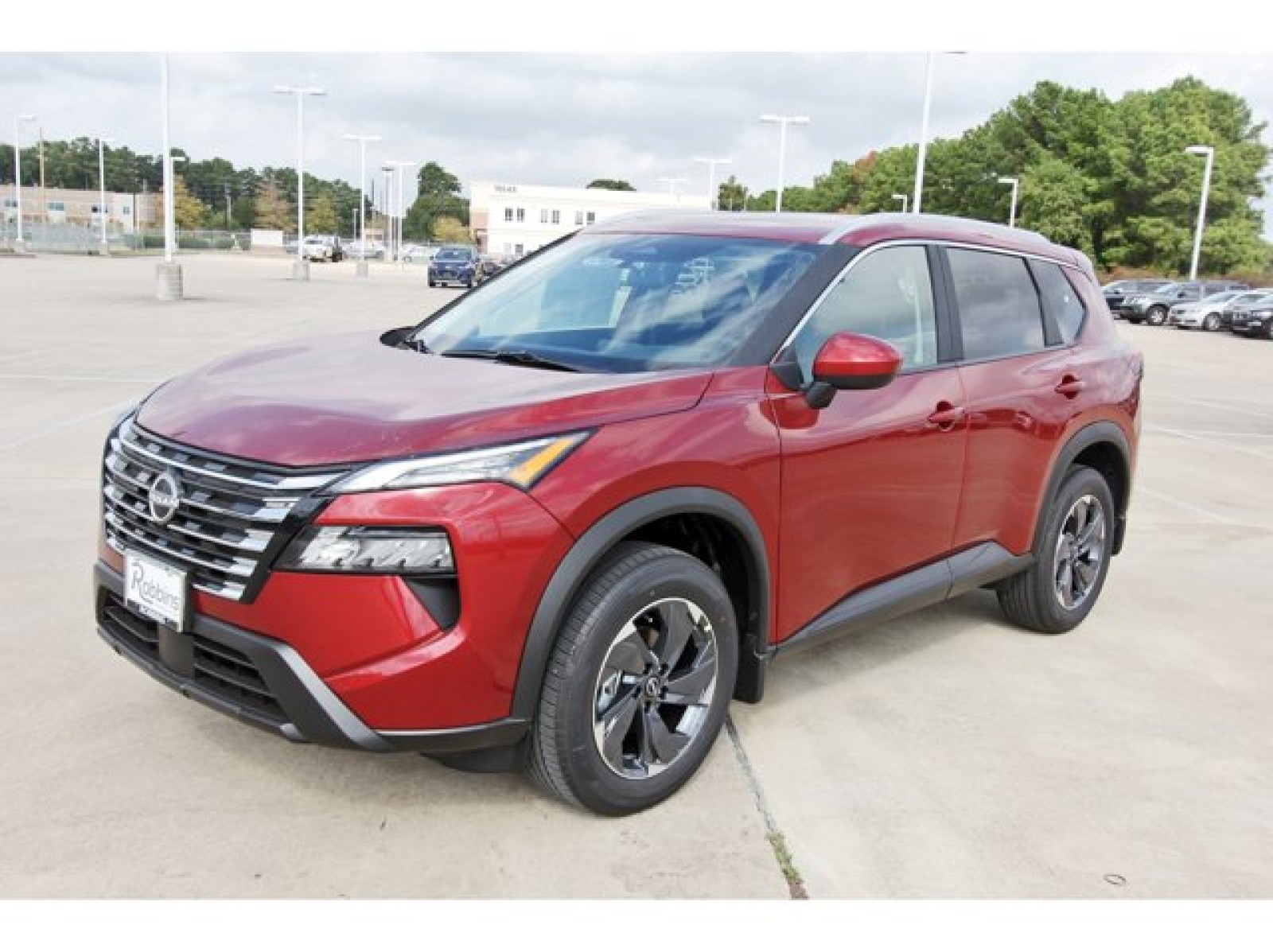 2026 Nissan Rogue SV Red at Robbins Nissan