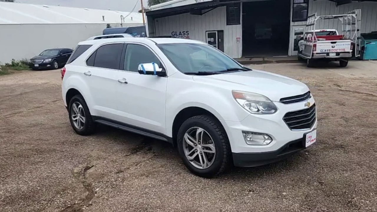 Used 2016 White Chevrolet LTZ image 1