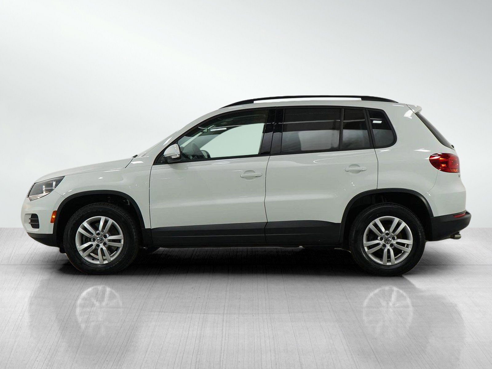 Used 2016 Volkswagen Tiguan S with VIN WVGAV7AX5GW566104 for sale in Minneapolis, Minnesota