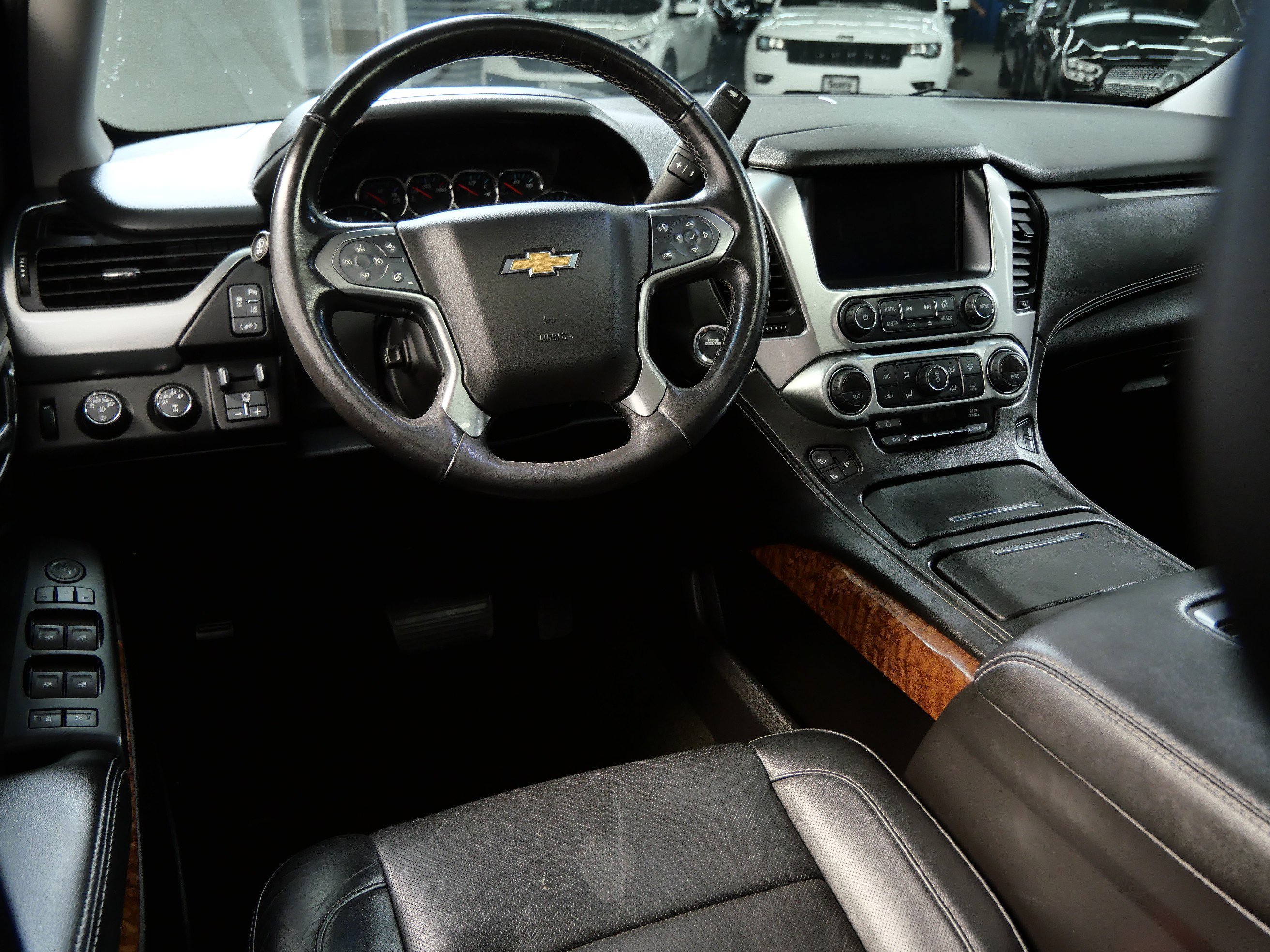 Used 2015 Chevrolet Tahoe LTZ with VIN 1GNSKCKC0FR743538 for sale in Minnetonka, Minnesota