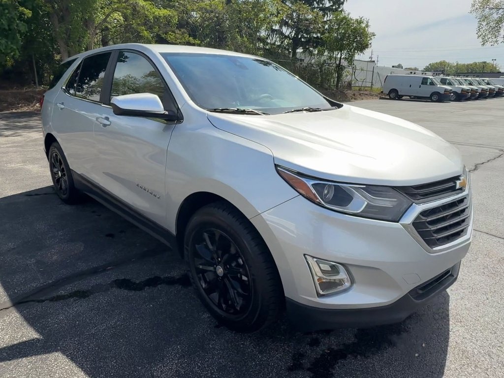 Used 2021 Chevrolet Equinox LT with VIN 3GNAXKEV1MS145201 for sale in Painesville, OH