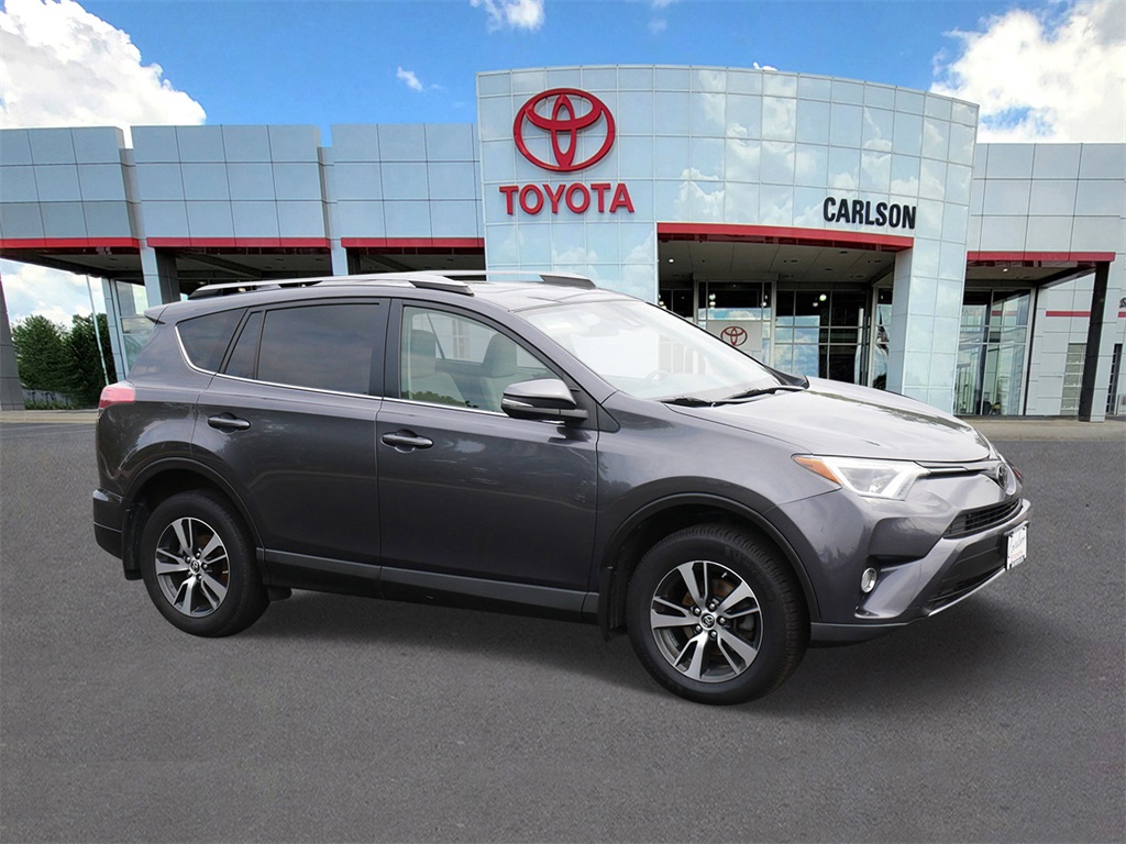 Used 2018 Toyota RAV4 XLE with VIN JTMRFREVXJJ733988 for sale in Minneapolis, Minnesota