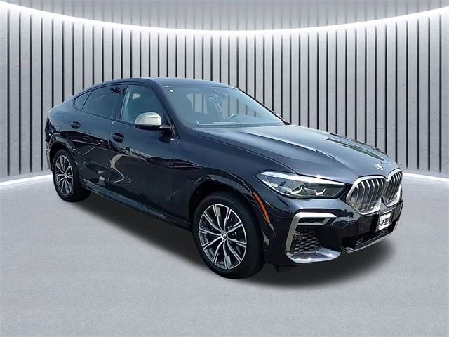 Used 2023 Black BMW M50i image 1