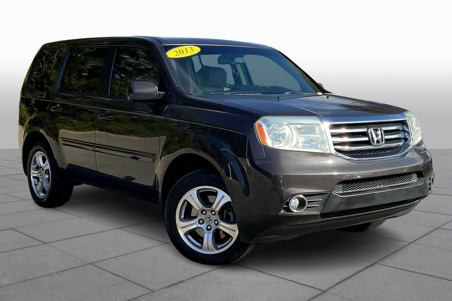 Used 2013 Honda Pilot EX-L with VIN 5FNYF4H55DB035181 for sale in Gulfport, MS