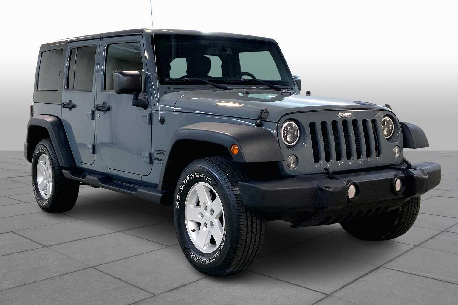 Used 2015 Jeep Wrangler Unlimited Sport with VIN 1C4BJWDGXFL597178 for sale in Kansas City