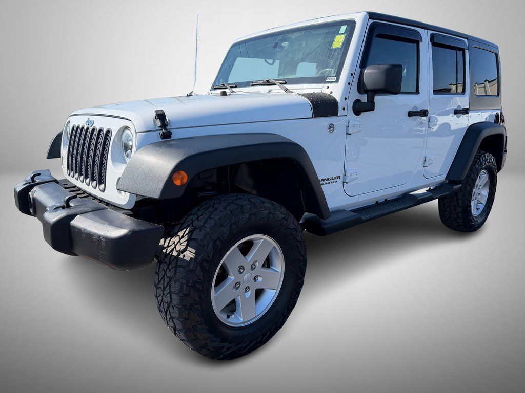 Used 2014 Jeep Wrangler Unlimited Sport with VIN 1C4BJWDG1EL101599 for sale in Albertville, AL
