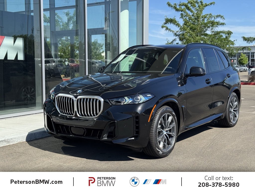 New 2026 Black Sapphire Metallic BMW xDrive50e image 1