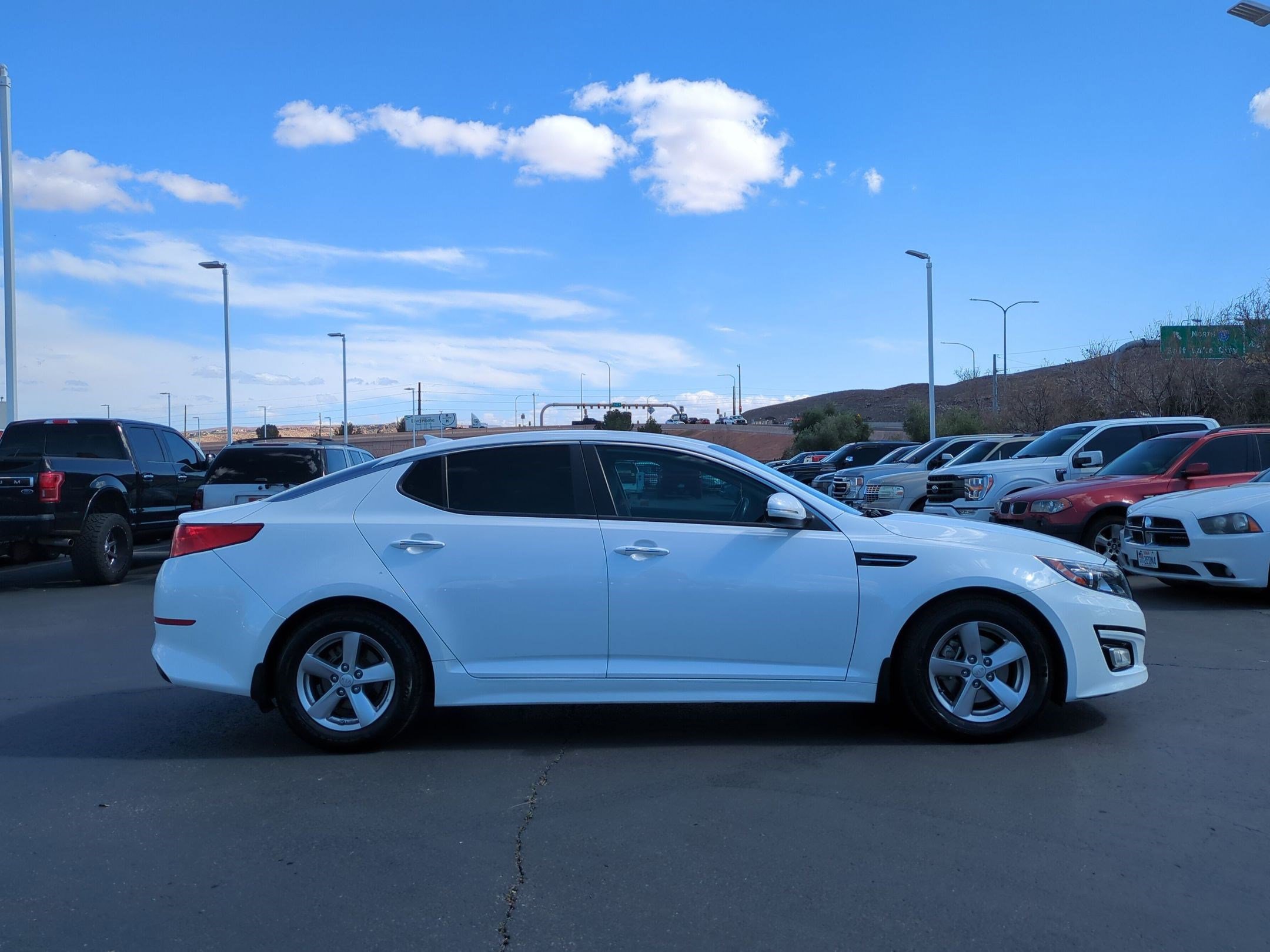Used 2015 Kia Optima LX with VIN 5XXGM4A71FG459602 for sale in St. George, UT
