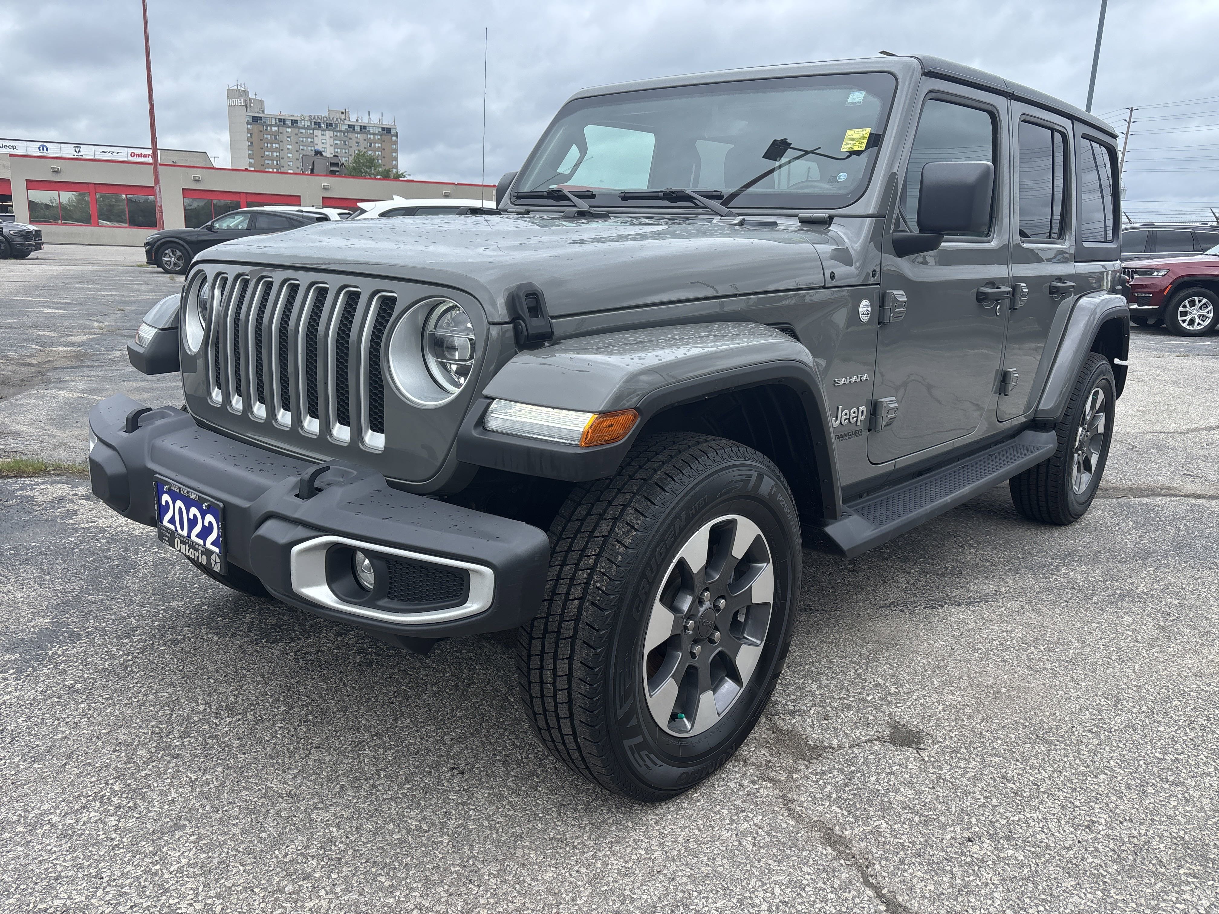 Used 2022 Sting-Grey Jeep Unlimited Sahara image 1