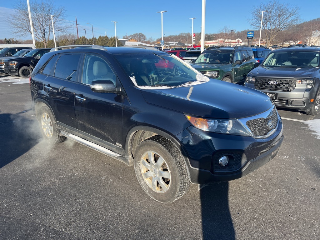 Used 2013 Kia Sorento LX with VIN 5XYKTCA60DG326112 for sale in Onalaska, WI