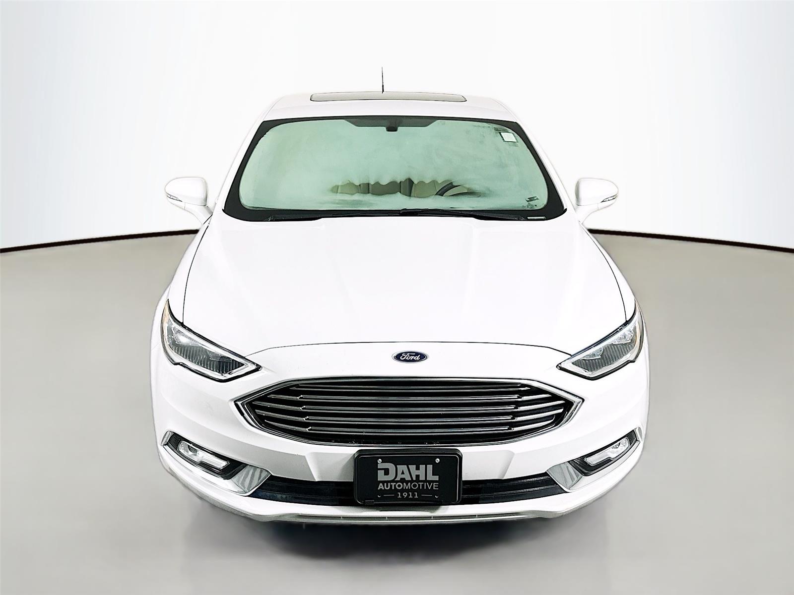 Used 2017 Ford Fusion Hybrid Titanium with VIN 3FA6P0RU8HR360579 for sale in Onalaska, WI