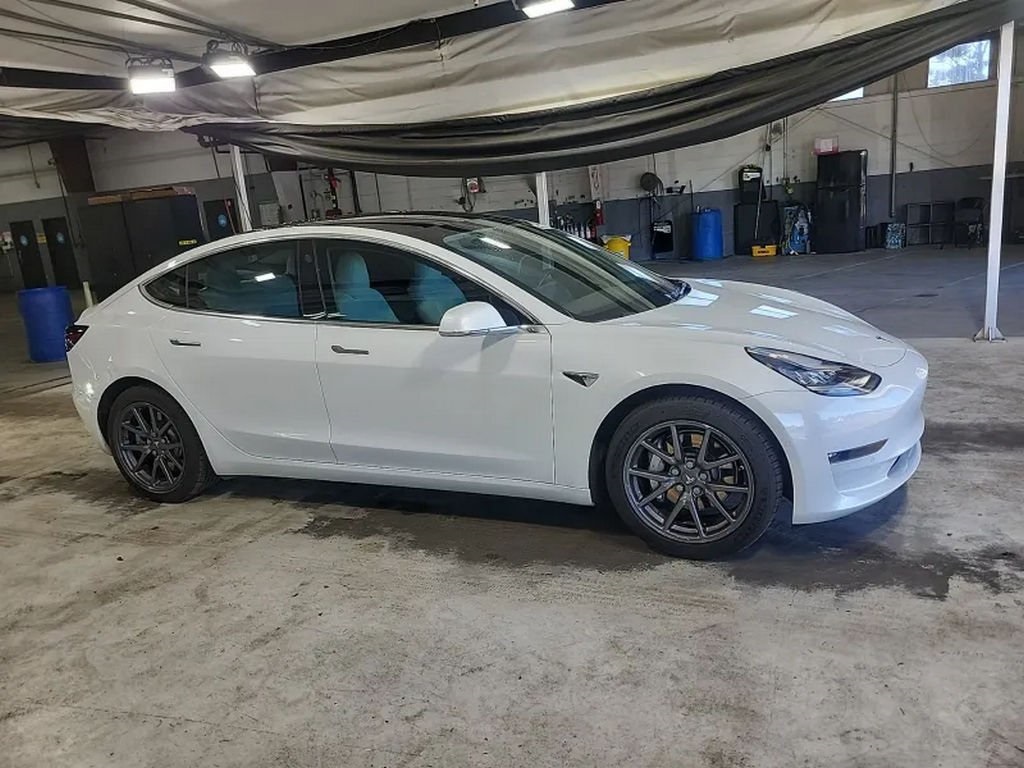 Used 2019 Tesla Model 3 Base with VIN 5YJ3E1EA3KF417817 for sale in Miami, FL