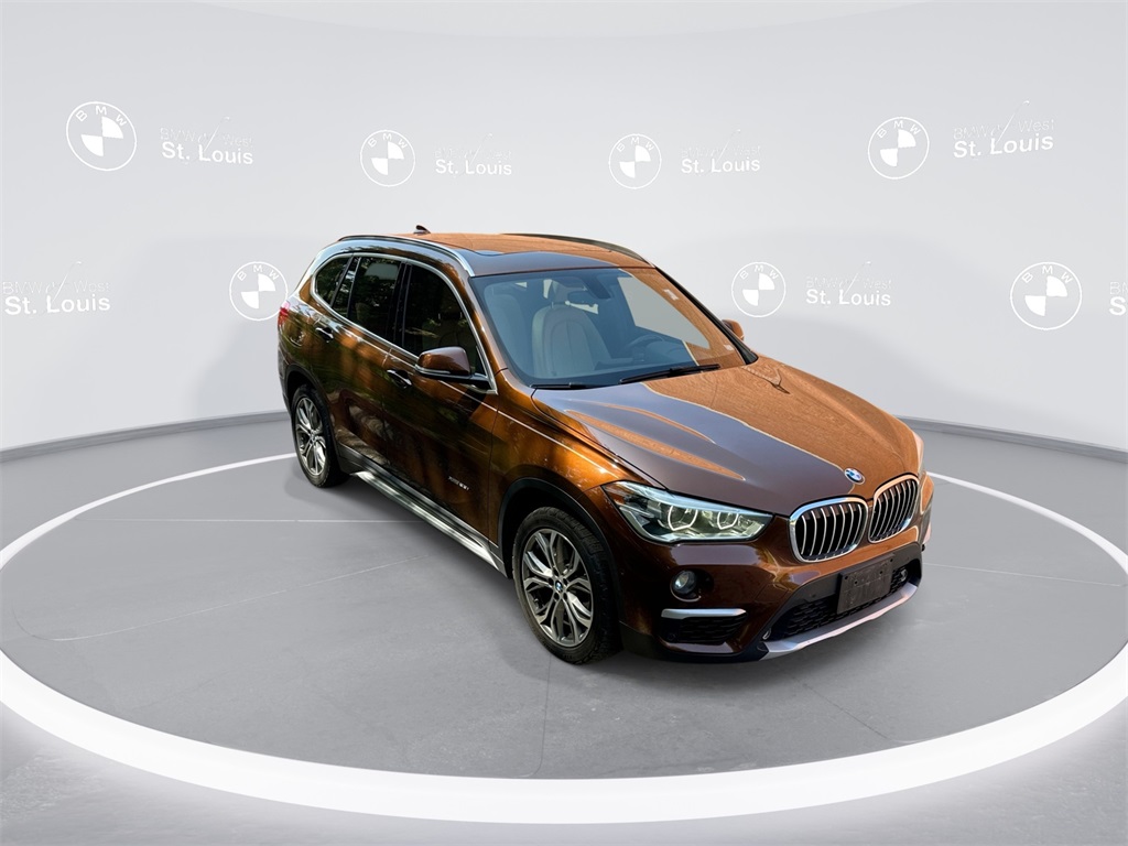 Used 2016 BMW X1 28i with VIN WBXHT3C37GP886632 for sale in Manchester, MO