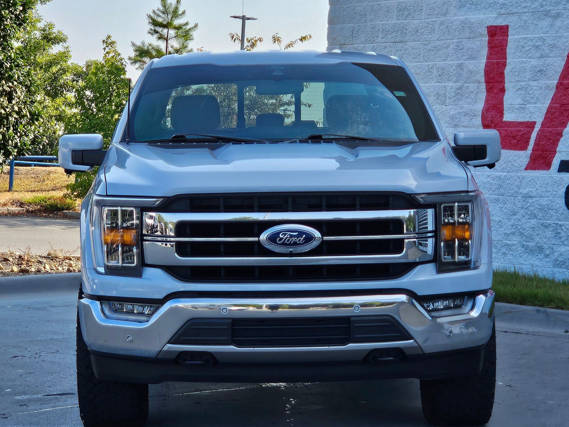 Used 2021 Ford F-150 Lariat with VIN 1FTFW1E57MKD00972 for sale in Little Rock