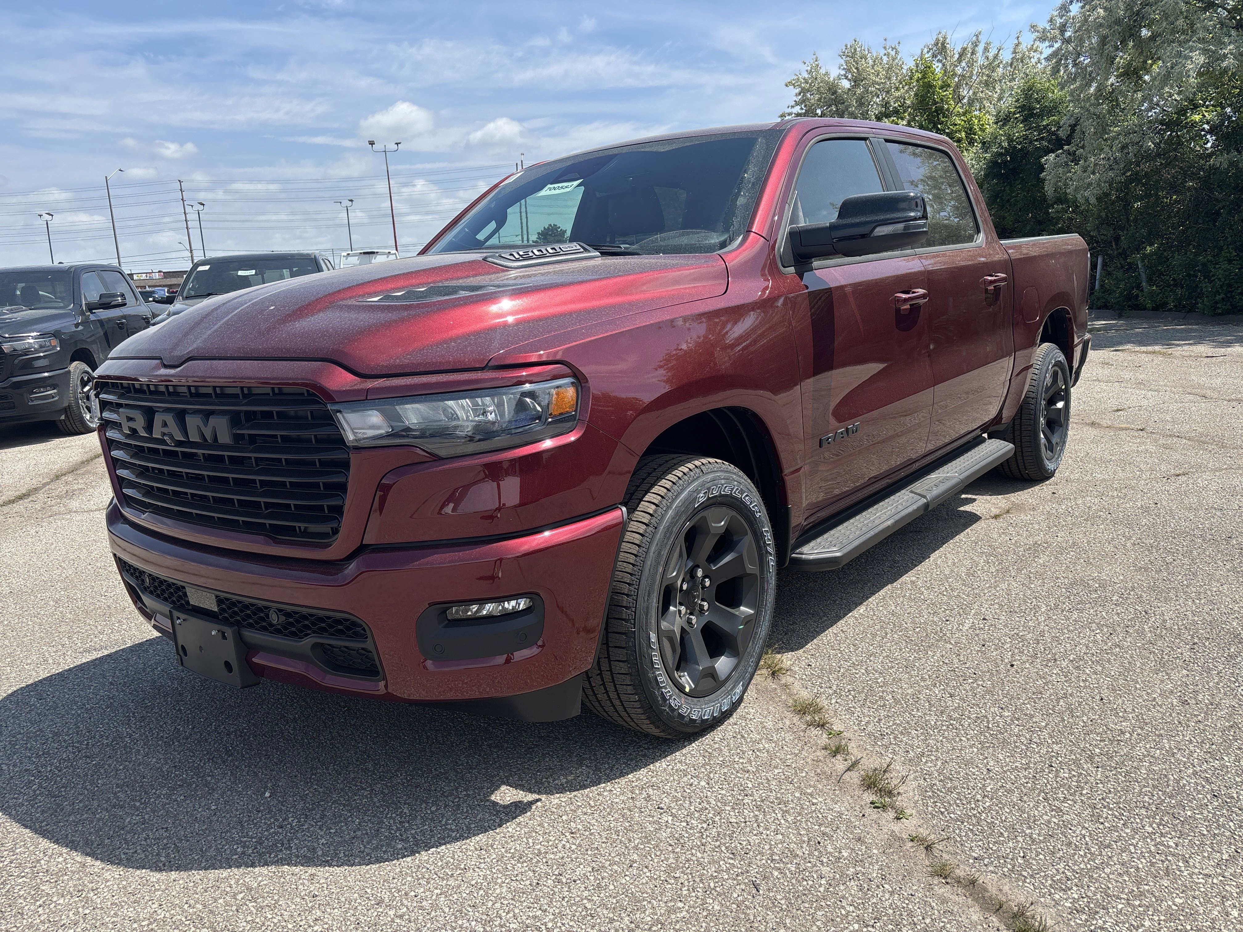 New 2025 Red Pearl Ram Sport image 1