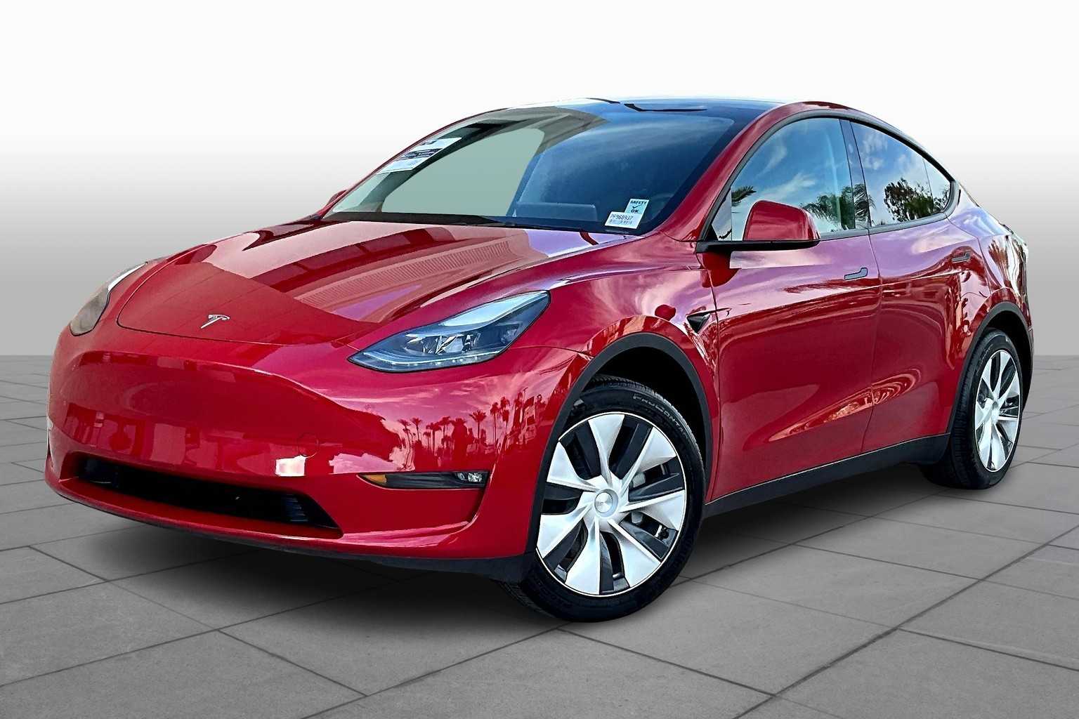 Used 2023 Tesla Model Y Base with VIN 7SAYGDED9PF968937 for sale in Newport Beach, CA