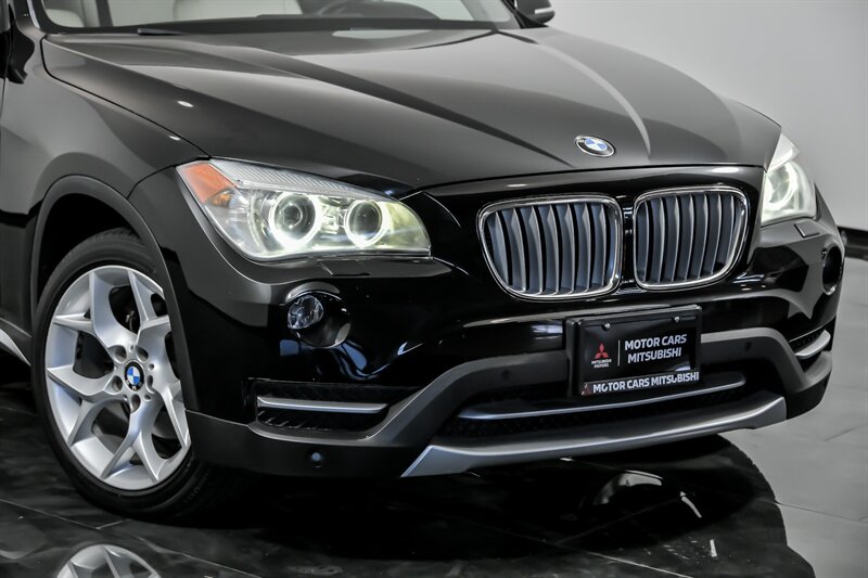 Used 2013 BMW X1 28i with VIN WBAVL1C57DVR88510 for sale in Aurora, IL