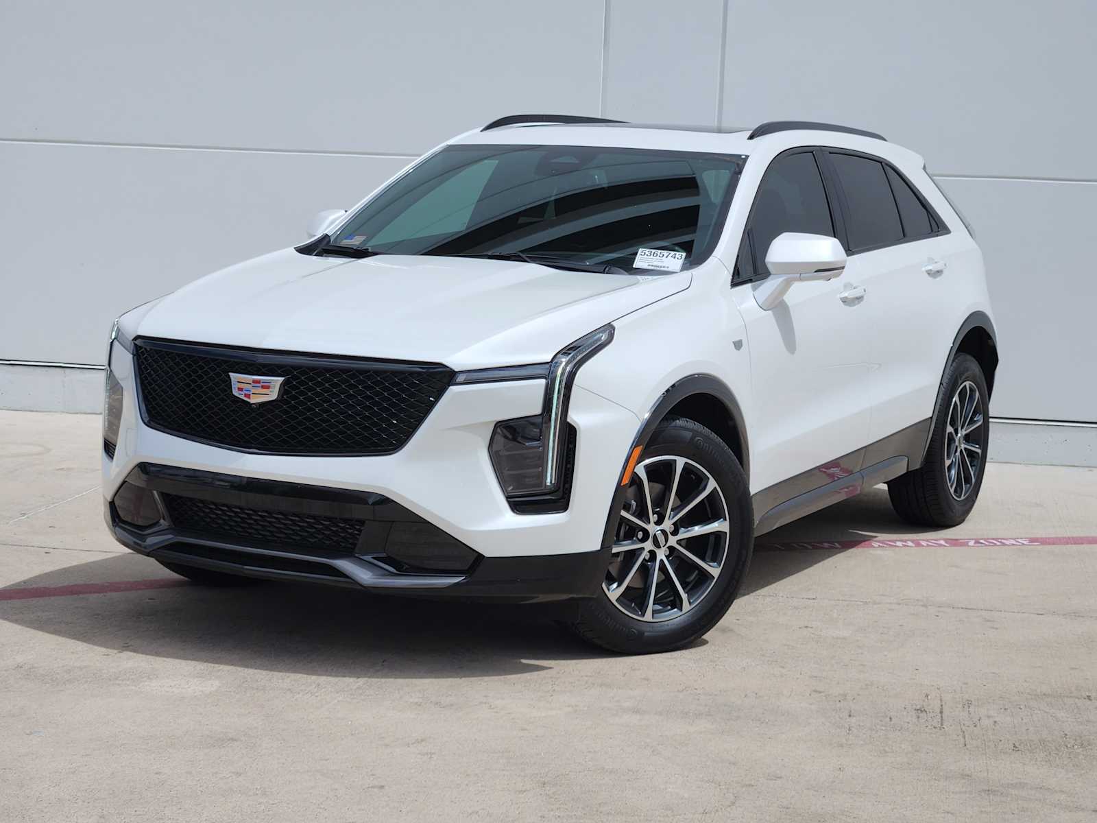 New 2025 Crystal White Tricoat Cadillac Sport image 1