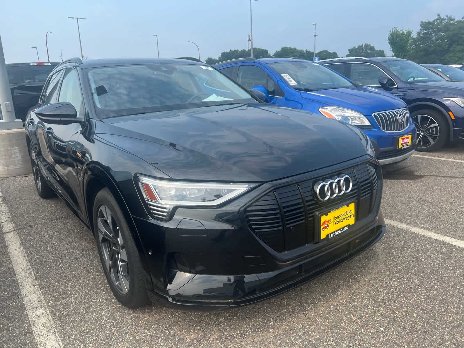 Used 2021 Audi e-tron Premium with VIN WA1AAAGE8MB031865 for sale in Minneapolis, MN