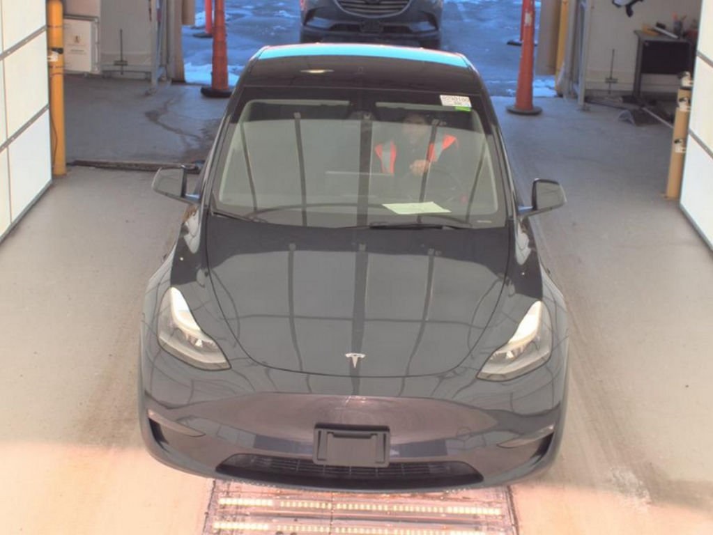 Used 2024 Tesla Model Y Long Range with VIN 7SAYGDEE9RA222299 for sale in Northfield, Minnesota