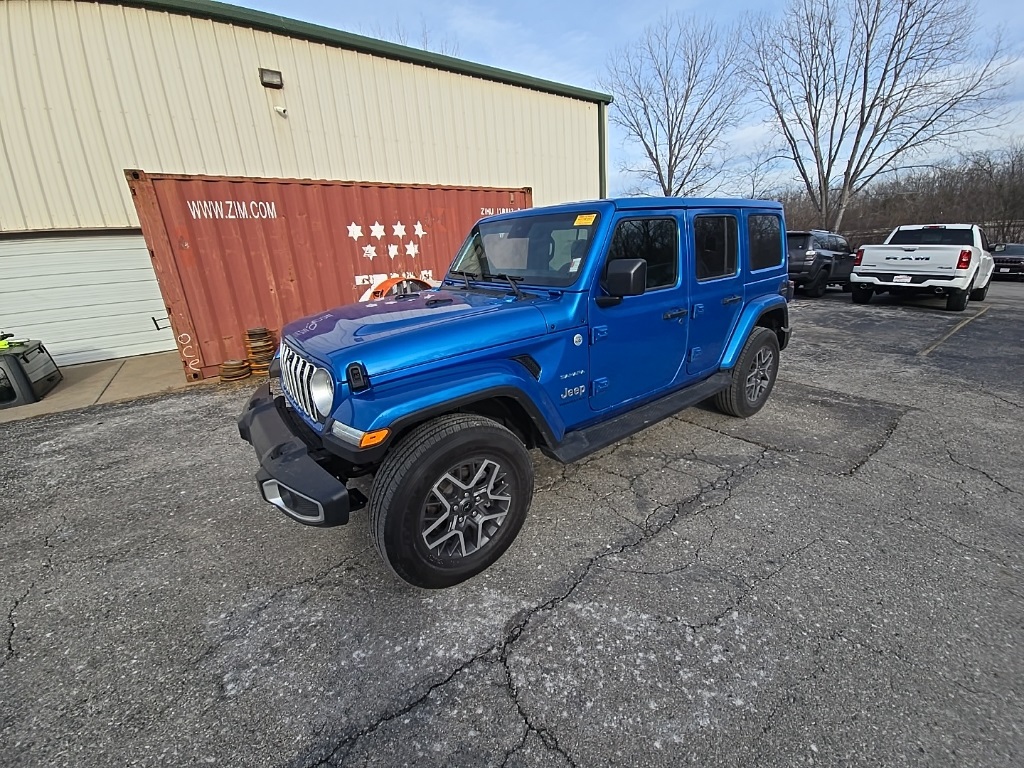 Used 2024 Jeep Wrangler 4-Door Sahara with VIN 1C4PJXEG2RW335717 for sale in Kansas City