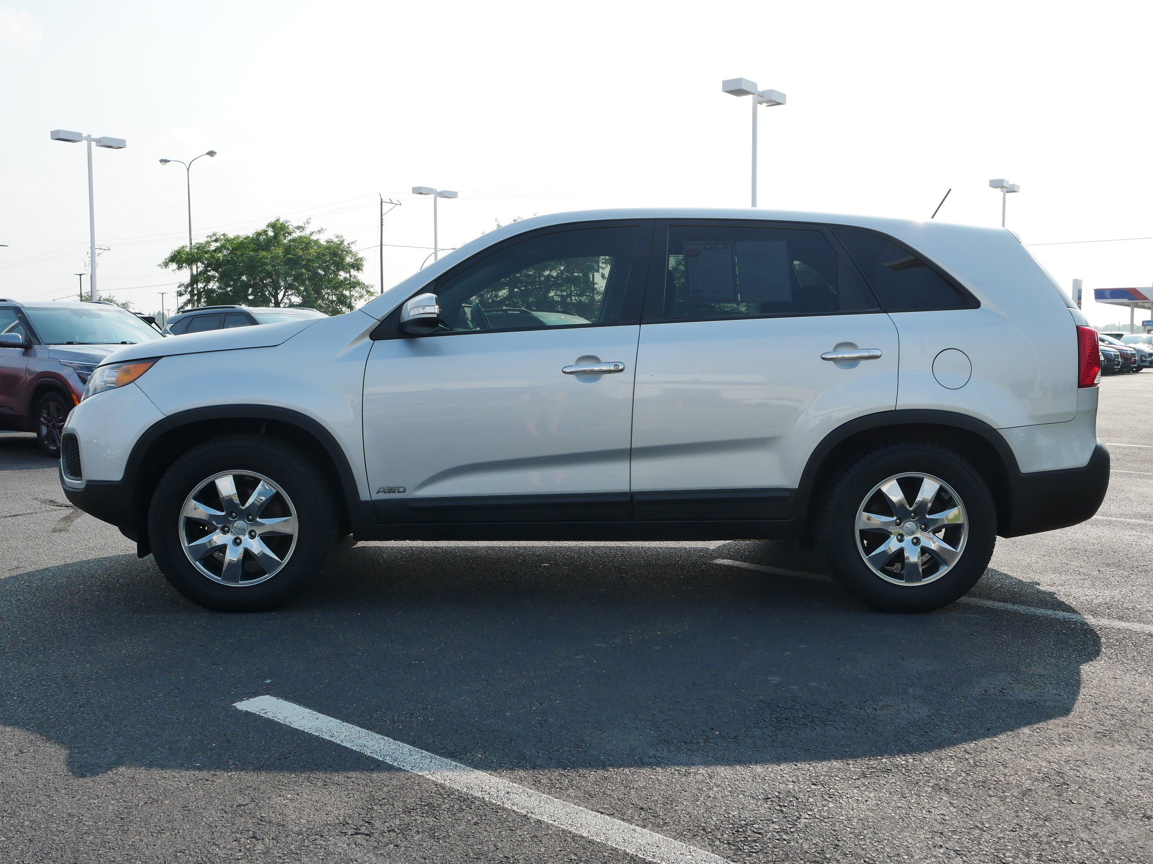Used 2013 Kia Sorento LX with VIN 5XYKTDA66DG345513 for sale in Waite Park, Minnesota