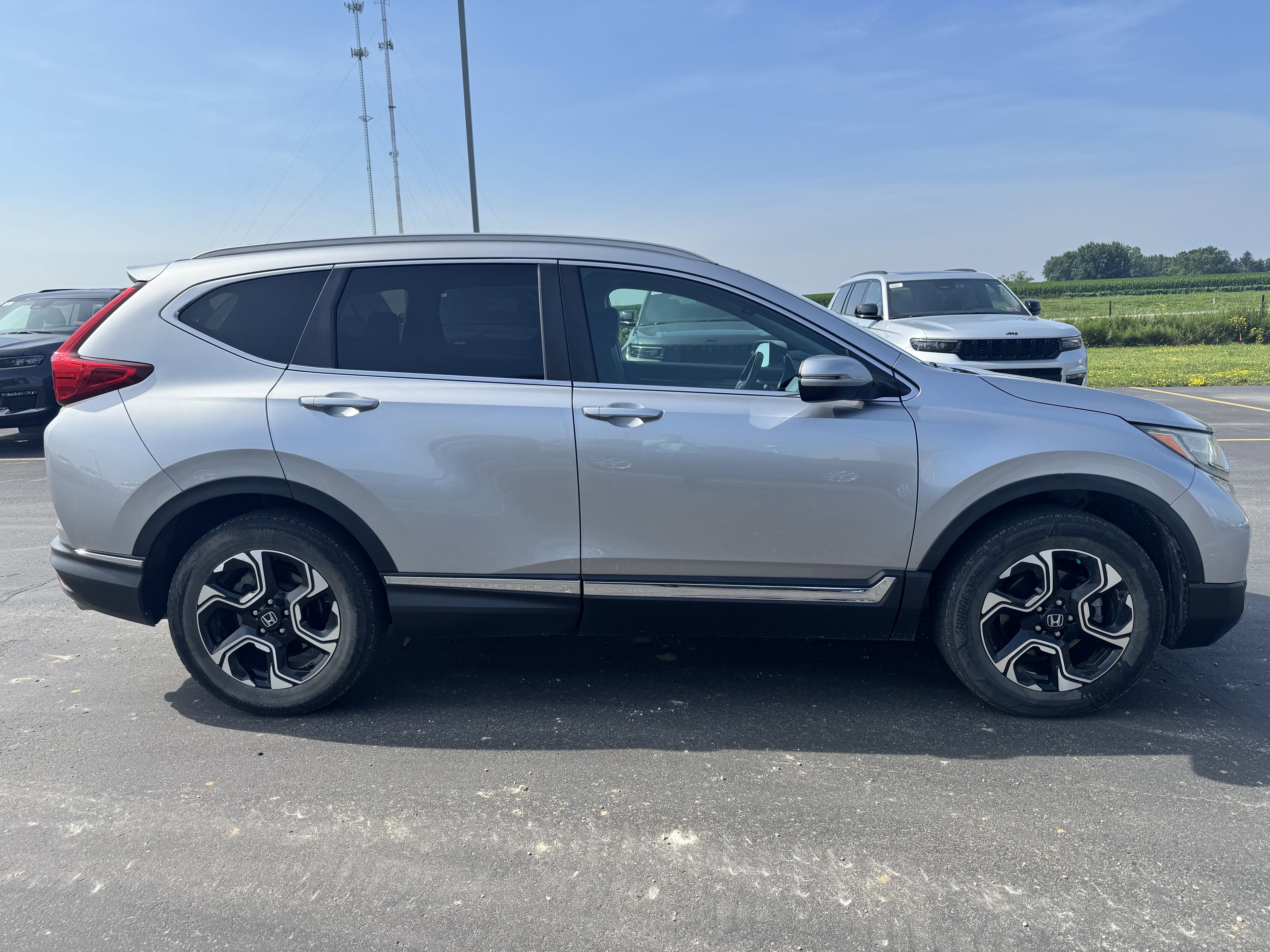 Used 2017 Honda CR-V Touring with VIN 2HKRW2H94HH663638 for sale in Saint Charles, Minnesota